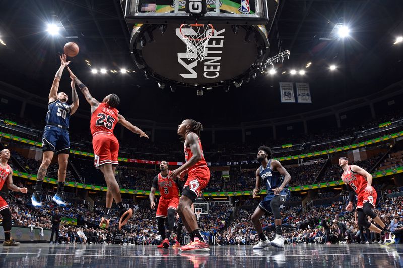 ORLANDO, FL - FEBRUARY 10: Cole Anthony #50 of the Orlando Magic shoots the ball during the game against the Chicago Bulls on February 10, 2024 at the Kia Center in Orlando, Florida. NOTE TO USER: User expressly acknowledges and agrees that, by downloading and or using this photograph, User is consenting to the terms and conditions of the Getty Images License Agreement. Mandatory Copyright Notice: Copyright 2024 NBAE (Photo by Fernando Medina/NBAE via Getty Images)