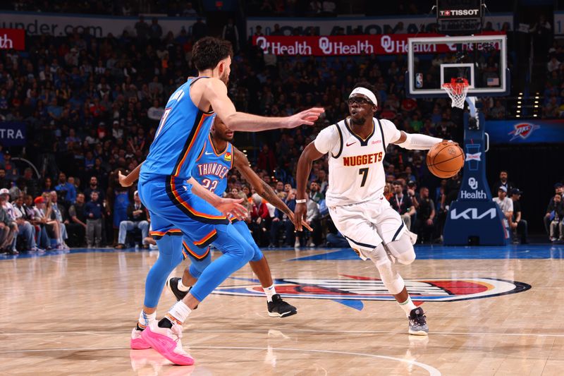 OKLAHOMA CITY, OK - JANUARY 31: Reggie Jackson #7 of the Denver Nuggets dribbles the ball during the game against the Oklahoma City Thunder on January 31, 2024 at Paycom Arena in Oklahoma City, Oklahoma. NOTE TO USER: User expressly acknowledges and agrees that, by downloading and or using this photograph, User is consenting to the terms and conditions of the Getty Images License Agreement. Mandatory Copyright Notice: Copyright 2024 NBAE (Photo by Zach Beeker/NBAE via Getty Images)