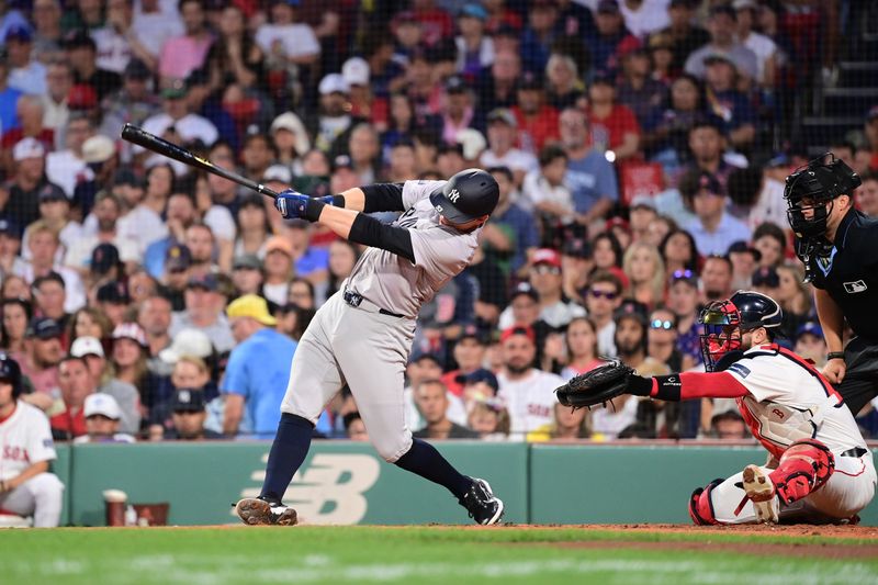 Jul 28, 2024; Boston, Massachusetts, USA; New York Yankees first baseman Ben Rice (93) hits an RBI single against the Boston Red Sox during the fourth inning at Fenway Park. Mandatory Credit: Eric Canha-USA TODAY Sports