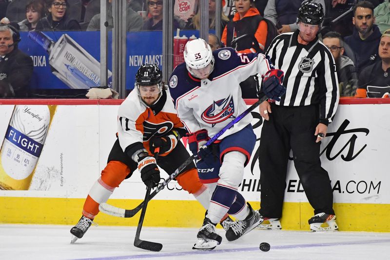 Jan 4, 2024; Philadelphia, Pennsylvania, USA; Philadelphia Flyers right wing Tyson Foerster (71) and Columbus Blue Jackets defenseman David Jiricek (55) during the first period at Wells Fargo Center. Mandatory Credit: Eric Hartline-USA TODAY Sports