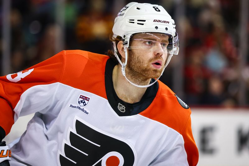 Dec 31, 2025; Calgary, Alberta, CAN; Philadelphia Flyers defenseman Cam York (8) skates against the Calgary Flames during the second period at Scotiabank Saddledome. Mandatory Credit: Sergei Belski-Imagn Images
