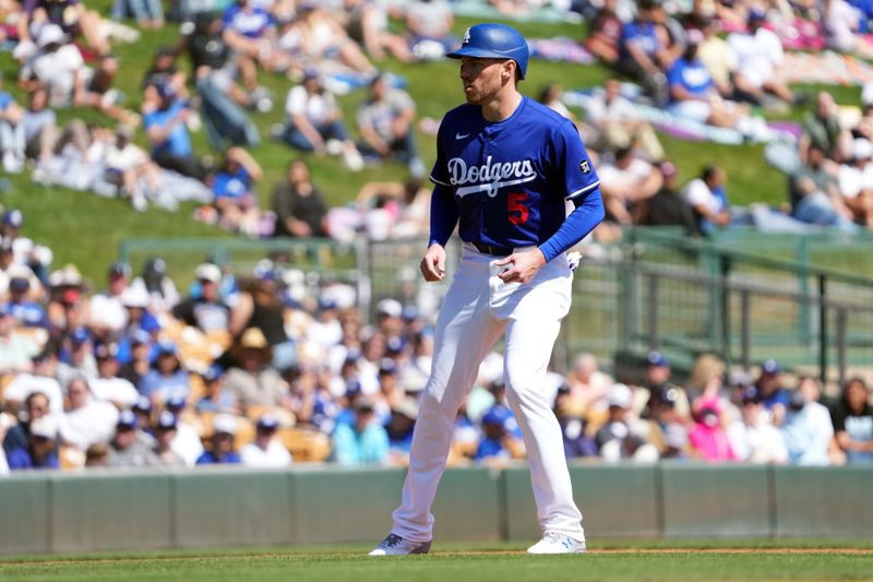 Mar 10, 2025; Phoenix, Arizona, USA; Los Angeles Dodgers first base Freddie Freeman (5) leads off second base against the Arizona Diamondbacks during the first inning at Camelback Ranch-Glendale. Mandatory Credit: Joe Camporeale-Imagn Images