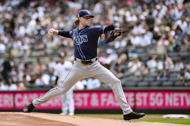 Jul 21, 2024; Bronx, New York, USA; Tampa Bay Rays pitcher Shane Baz (11) throws against the New York Yankees during the first inning at Yankee Stadium. Mandatory Credit: John Jones-USA TODAY Sports