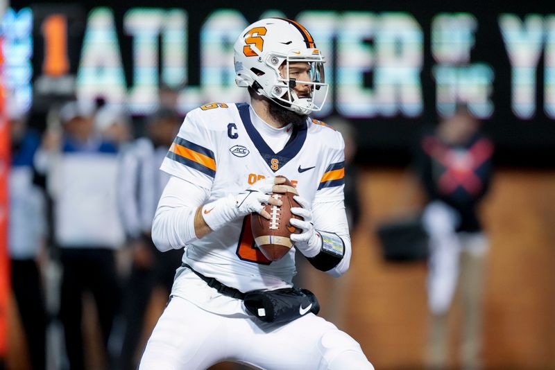 Nov 19, 2022; Winston-Salem, North Carolina, USA; Syracuse Orange quarterback Garrett Shrader (6) drops back to pass against the Wake Forest Demon Deacons  during the first half at Truist Field. Mandatory Credit: Jim Dedmon-USA TODAY Sports