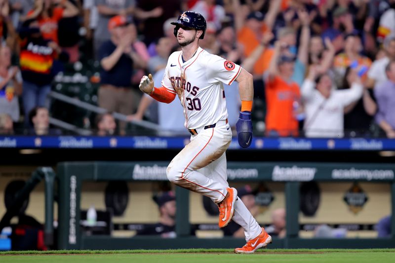 Apr 30, 2024; Houston, Texas, USA; Houston Astros right fielder Kyle Tucker (30) runs toward home plate to score a run against the Cleveland Guardians during the fourth inning at Minute Maid Park. Mandatory Credit: Erik Williams-USA TODAY Sports