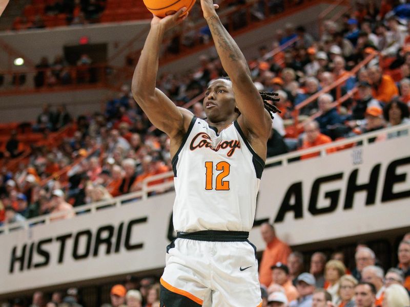 Nov 30, 2023; Stillwater, Oklahoma, USA; Oklahoma State Cowboys guard Javon Small (12) puts up a shot during the first half against the Creighton Bluejays at Gallagher-Iba Arena. Mandatory Credit: William Purnell-USA TODAY Sports