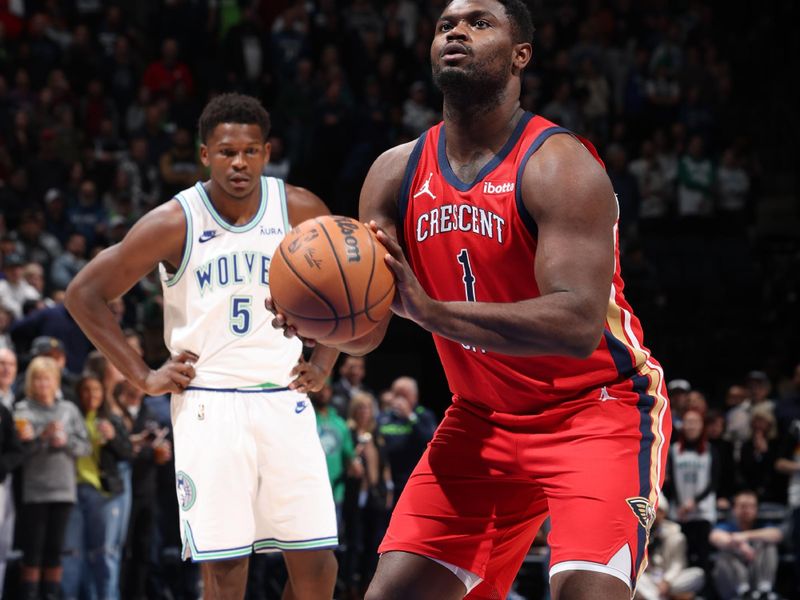 MINNEAPOLIS, MN -  JANUARY 3: Zion Williamson #1 of the New Orleans Pelicans shoots a free throw while Anthony Edwards #5 of the Minnesota Timberwolves looks on during the game on January 3, 2024 at Target Center in Minneapolis, Minnesota. NOTE TO USER: User expressly acknowledges and agrees that, by downloading and or using this Photograph, user is consenting to the terms and conditions of the Getty Images License Agreement. Mandatory Copyright Notice: Copyright 2024 NBAE (Photo by David Sherman/NBAE via Getty Images)