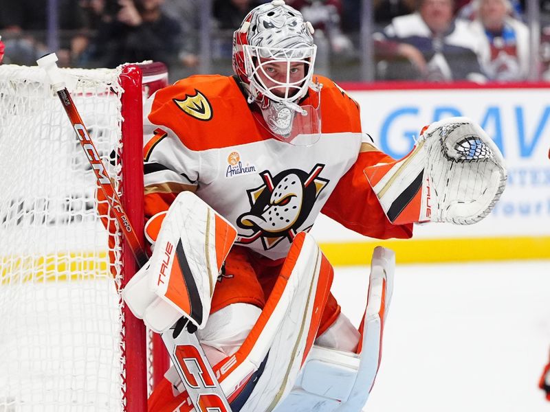 Oct 18, 2024; Denver, Colorado, USA; Anaheim Ducks goaltender Lukas Dostal (1) defends his net in the second period against the Colorado Avalanche at Ball Arena. Mandatory Credit: Ron Chenoy-Imagn Images