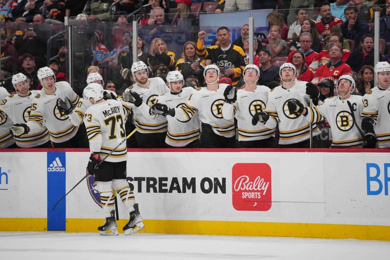 Mar 26, 2024; Sunrise, Florida, USA; Boston Bruins defenseman Charlie McAvoy (73) celebrates a goal against the Florida Panthers in the first period at Amerant Bank Arena. Mandatory Credit: Jim Rassol-USA TODAY Sports