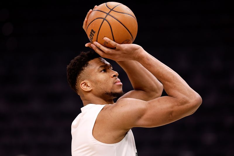 MILWAUKEE, WISCONSIN - JANUARY 14: Giannis Antetokounmpo #34 of the Milwaukee Bucks warms up before the game against the Sacramento Kings at Fiserv Forum on January 14, 2024 in Milwaukee, Wisconsin. NOTE TO USER: User expressly acknowledges and agrees that, by downloading and or using this photograph, User is consenting to the terms and conditions of the Getty Images License Agreement. (Photo by John Fisher/Getty Images)