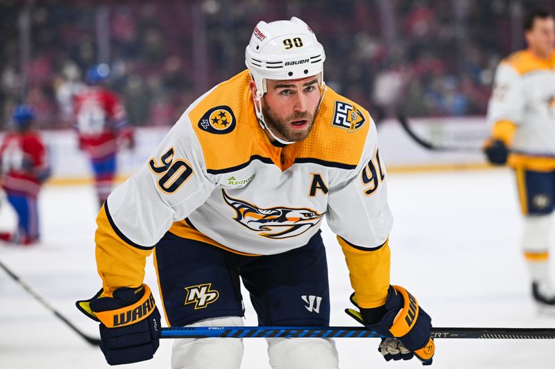 Dec 10, 2023; Montreal, Quebec, CAN; Nashville Predators center Ryan O'Reilly (90) looks on during warm-up before the game against the Montreal Canadiens at Bell Centre. Mandatory Credit: David Kirouac-USA TODAY Sports