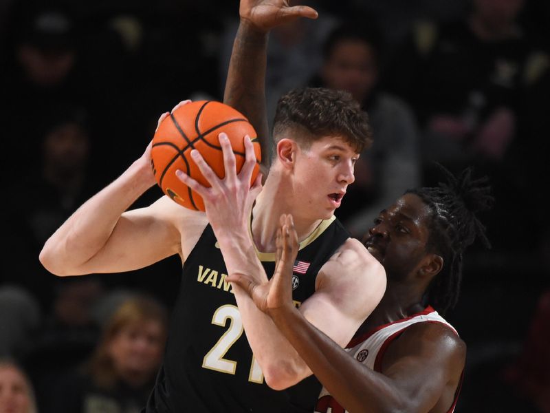 Jan 14, 2023; Nashville, Tennessee, USA; Vanderbilt Commodores forward Liam Robbins (21) works against Arkansas Razorbacks forward Makhel Mitchell (22) during the second half at Memorial Gymnasium. Mandatory Credit: Christopher Hanewinckel-USA TODAY Sports