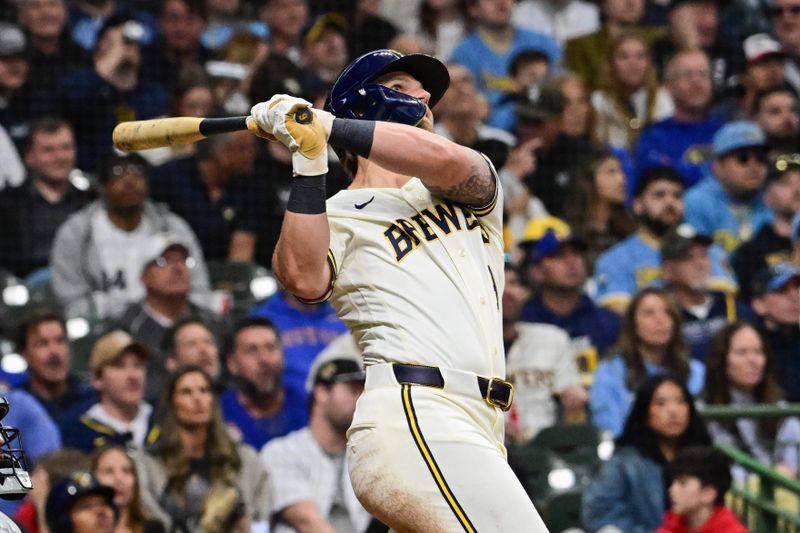 Mar 26, 2026; Milwaukee, Wisconsin, USA; Milwaukee Brewers left fielder Jake Bauers (9) hits a 3-run home run in the seventh inning against the Chicago White Sox at American Family Field. Mandatory Credit: Benny Sieu-Imagn Images
