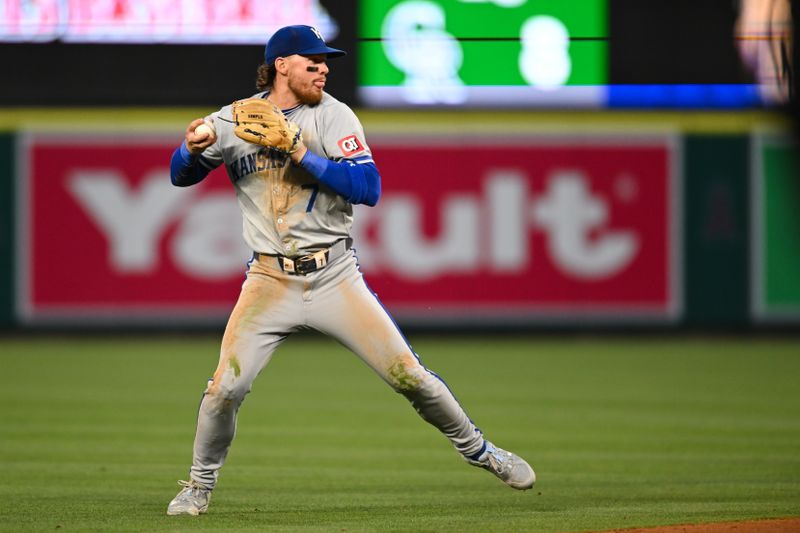 May 11, 2024; Anaheim, California, USA; Kansas City Royals shortstop Bobby Witt Jr. (7) fields the ball against the Los Angeles Angels during the fourth inning at Angel Stadium. Mandatory Credit: Jonathan Hui-USA TODAY Sports