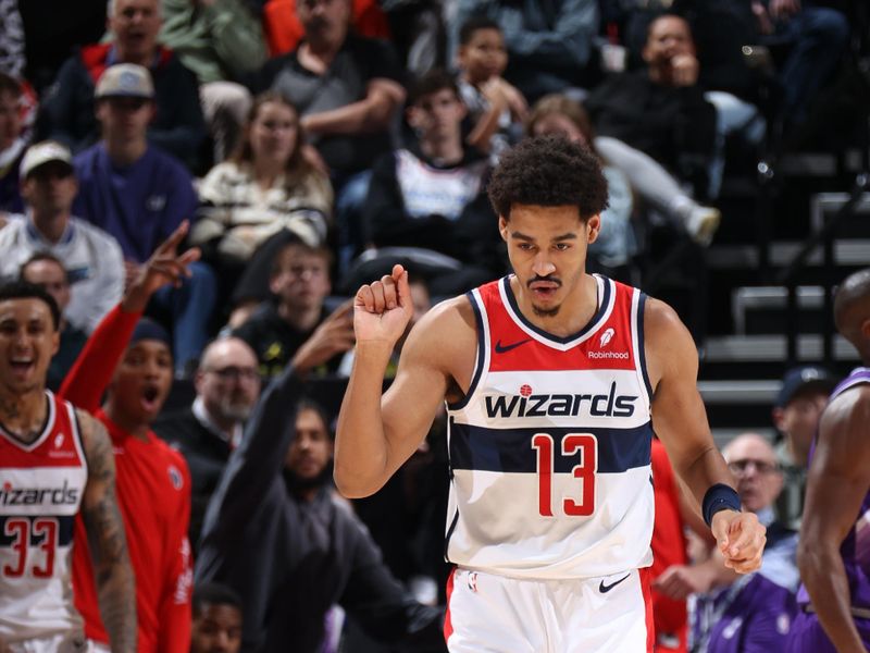 SALT LAKE CITY, UT - MARCH 4:  Jordan Poole #13 of the Washington Wizards reacts during the game against the Utah Jazz on March 4, 2024 at vivint.SmartHome Arena in Salt Lake City, Utah. NOTE TO USER: User expressly acknowledges and agrees that, by downloading and or using this Photograph, User is consenting to the terms and conditions of the Getty Images License Agreement. Mandatory Copyright Notice: Copyright 2024 NBAE (Photo by Melissa Majchrzak/NBAE via Getty Images)