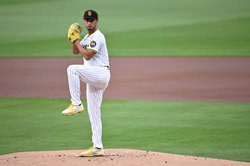 Apr 30, 2024; San Diego, California, USA; San Diego Padres starting pitcher Yu Darvish (11) throws a pitch against the Cincinnati Reds during the first inning at Petco Park. Mandatory Credit: Orlando Ramirez-USA TODAY Sports