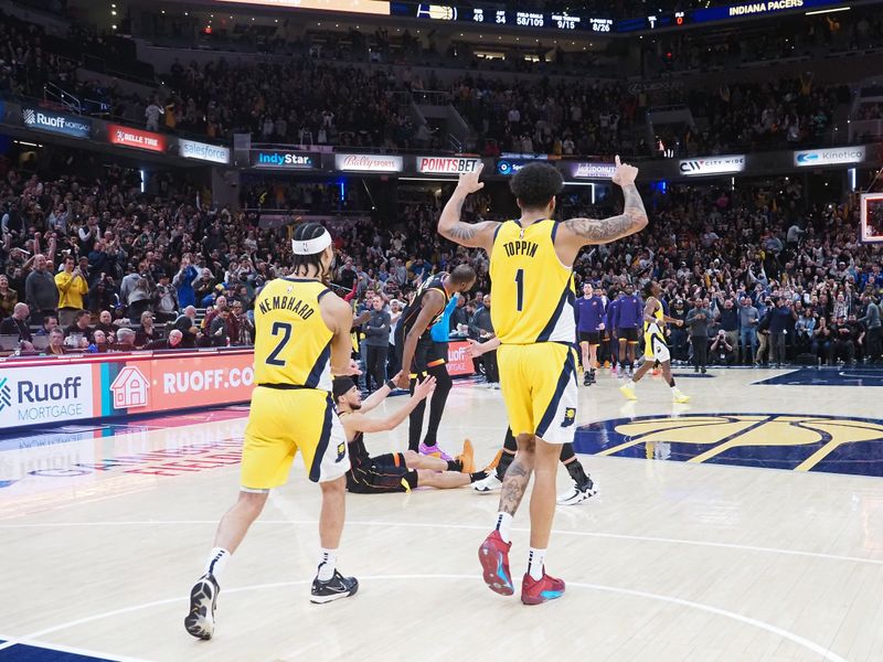 INDIANAPOLIS, IN - JANUARY 26: Andrew Nembhard #2 and Obi Toppin #1 of the Indiana Pacers celebrate after the game against the Phoenix Suns on January 26, 2024 at Gainbridge Fieldhouse in Indianapolis, Indiana. NOTE TO USER: User expressly acknowledges and agrees that, by downloading and or using this Photograph, user is consenting to the terms and conditions of the Getty Images License Agreement. Mandatory Copyright Notice: Copyright 2024 NBAE (Photo by Ron Hoskins/NBAE via Getty Images)