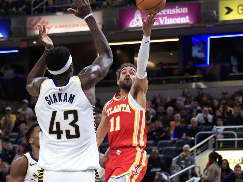 INDIANAPOLIS, INDIANA - FEBRUARY 01: Trae Young #11 of the Atlanta Hawks takes a shot over Pascal Siakam #43 of the Indiana Pacers during the first half at Gainbridge Fieldhouse on February 01, 2025 in Indianapolis, Indiana. NOTE TO USER: User expressly acknowledges and agrees that, by downloading and or using this photograph, User is consenting to the terms and conditions of the Getty Images License Agreement. (Photo by Justin Casterline/Getty Images)