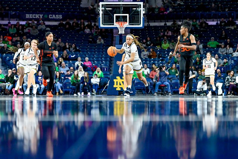 Jan 14, 2024; South Bend, Indiana, USA; Notre Dame Fighting Irish guard Hannah Hidalgo (3) dribbles down the court in the first half against the Miami Hurricanes at the Purcell Pavilion. Mandatory Credit: Matt Cashore-USA TODAY Sports