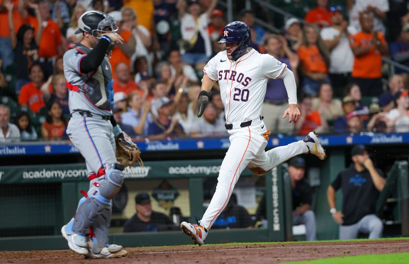 Jul 9, 2024; Houston, Texas, USA;  Houston Astros right fielder Chas McCormick (20) scores against the Miami Marlins in the fifth inning at Minute Maid Park. Mandatory Credit: Thomas Shea-USA TODAY Sports