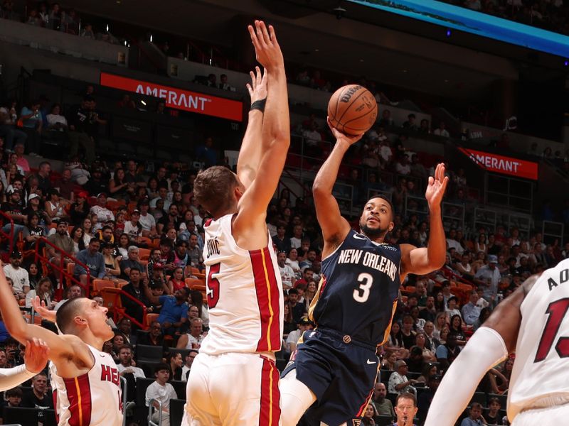 MIAMI, FL - OCTOBER 13: CJ McCollum #3 of the New Orleans Pelicans shoots the ball during the game against the Miami Heat during a NBA pre season game on October 13, 2024 at Kaseya Center in Miami, Florida. NOTE TO USER: User expressly acknowledges and agrees that, by downloading and or using this Photograph, user is consenting to the terms and conditions of the Getty Images License Agreement. Mandatory Copyright Notice: Copyright 2024 NBAE (Photo by Issac Baldizon/NBAE via Getty Images)