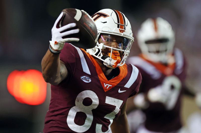 Sep 30, 2023; Blacksburg, Virginia, USA; Virginia Tech Hokies wide receiver Jaylin Lane (83) scores a touchdown during the third quarter against the Pittsburgh Panthers at Lane Stadium. Mandatory Credit: Peter Casey-USA TODAY Sports