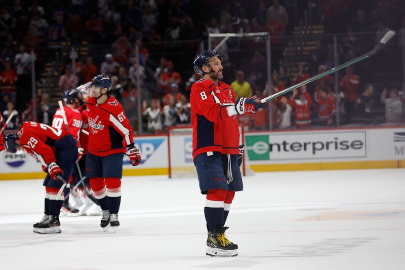 Apr 28, 2024; Washington, District of Columbia, USA; Washington Capitals left wing Alex Ovechkin (8) offers his stick to a young fan prior to leaving the ice after the Capitals game against the New York Rangers in game four of the first round of the 2024 Stanley Cup Playoffs at Capital One Arena. Mandatory Credit: Geoff Burke-USA TODAY Sports