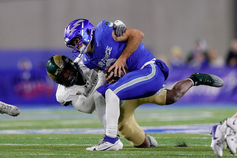 Oct 19, 2024; Colorado Springs, Colorado, USA; Air Force Falcons quarterback John Busha (3) is sacked by Colorado State Rams defensive lineman Mukendi Wa-Kalonji (92) in the third quarter at Falcon Stadium. Mandatory Credit: Isaiah J. Downing-Imagn Images