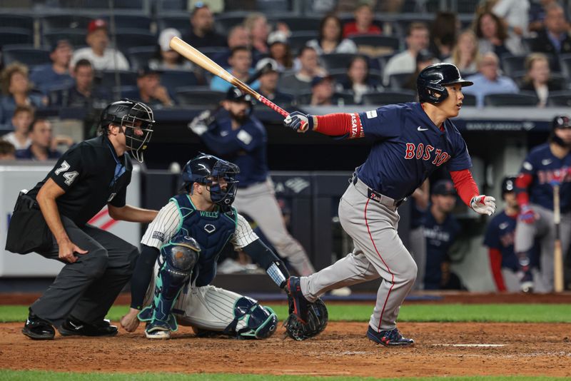 Sep 13, 2024; Bronx, New York, USA; Boston Red Sox left fielder Masataka Yoshida (7) singles during the eighth inning against the New York Yankees at Yankee Stadium. Mandatory Credit: Vincent Carchietta-Imagn Images