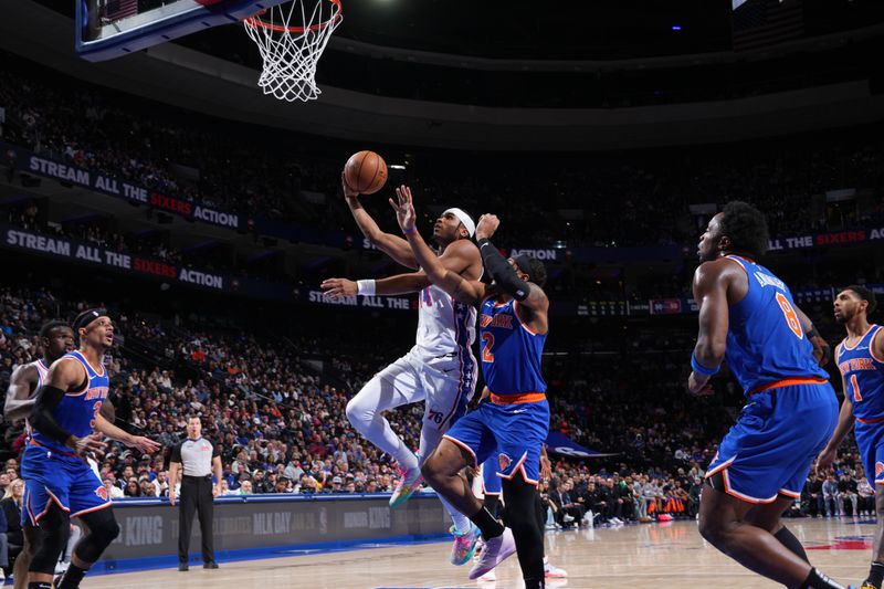 PHILADELPHIA, PA - JANUARY 15: Ricky Council IV #14 of the Philadelphia 76ers drives to the basket during the game against the New York Knicks on January 15, 2025 at the Wells Fargo Center in Philadelphia, Pennsylvania NOTE TO USER: User expressly acknowledges and agrees that, by downloading and/or using this Photograph, user is consenting to the terms and conditions of the Getty Images License Agreement. Mandatory Copyright Notice: Copyright 2025 NBAE (Photo by Jesse D. Garrabrant/NBAE via Getty Images)