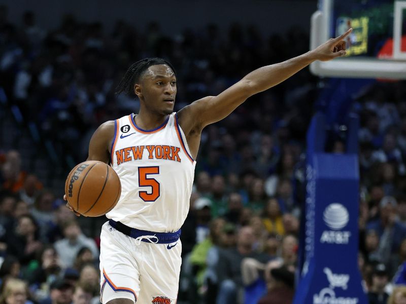 DALLAS, TEXAS - DECEMBER 27:  Immanuel Quickley #5 of the New York Knicks calls a play against the Dallas Mavericks in the first half at American Airlines Center on December 27, 2022 in Dallas, Texas. NOTE TO USER: User expressly acknowledges and agrees that, by downloading and or using this photograph, User is consenting to the terms and conditions of the Getty Images License Agreement.  (Photo by Tim Heitman/Getty Images)