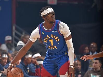 CLEVELAND, OH - NOVEMBER 19: Reggie Jackson #7 of the Denver Nuggets dribbles the ball during the game against the Cleveland Cavaliers on November 19, 2023 at Rocket Mortgage FieldHouse in Cleveland, Ohio. NOTE TO USER: User expressly acknowledges and agrees that, by downloading and/or using this Photograph, user is consenting to the terms and conditions of the Getty Images License Agreement. Mandatory Copyright Notice: Copyright 2023 NBAE (Photo by David Liam Kyle/NBAE via Getty Images)