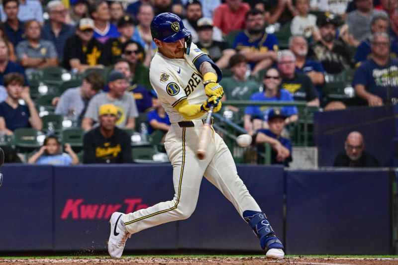 Jun 24, 2025; Milwaukee, Wisconsin, USA;  Milwaukee Brewers shortstop Joey Ortiz (3) hits a two-run home run in the third inning against the Pittsburgh Pirates at American Family Field. Mandatory Credit: Benny Sieu-Imagn Images