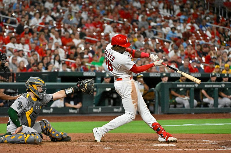 Aug 14, 2023; St. Louis, Missouri, USA;  St. Louis Cardinals right fielder Jordan Walker (18) hits a go-ahead three run triple against the Oakland Athletics during the seventh inning at Busch Stadium. Mandatory Credit: Jeff Curry-USA TODAY Sports