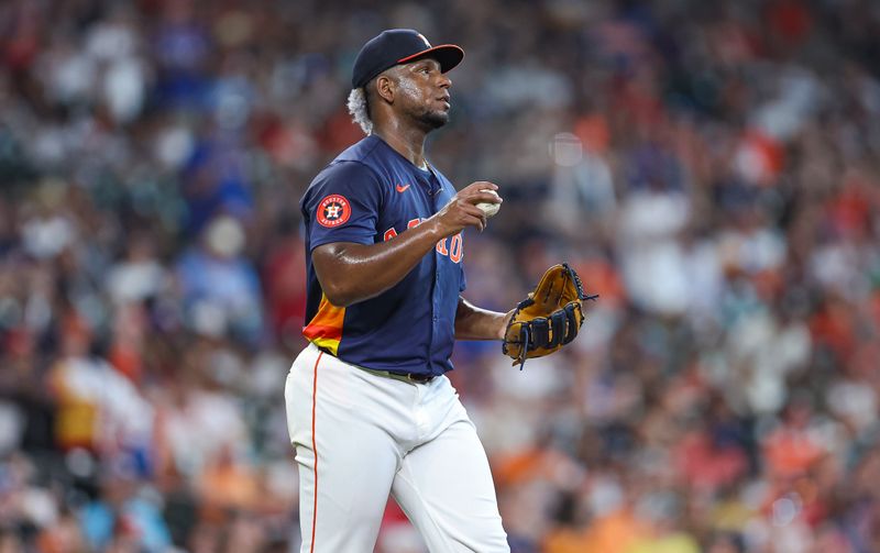 Jul 14, 2024; Houston, Texas, USA; Houston Astros starting pitcher Ronel Blanco (56) reacts after giving up a home run to Texas Rangers third baseman Josh Smith (not pictured) during the first inning at Minute Maid Park. Mandatory Credit: Troy Taormina-USA TODAY Sports