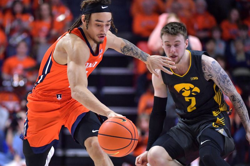 Feb 25, 2025; Champaign, Illinois, USA;  Illinois Fighting Illini guard Dra Gibbs-Lawhorn (2) drives the ball as Iowa Hawkeyes guard Brock Harding (2) defends during the second half at State Farm Center. Mandatory Credit: Ron Johnson-Imagn Images