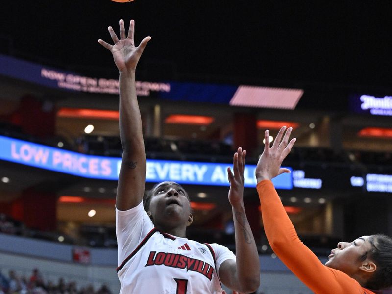 Jan 4, 2026; Louisville, Kentucky, USA;  Louisville Cardinals guard Reyna Scott (1) shoots against Virginia Tech Hokies forward Carys Baker (10) during the first half at KFC Yum! Center. Mandatory Credit: Jamie Rhodes-Imagn Images