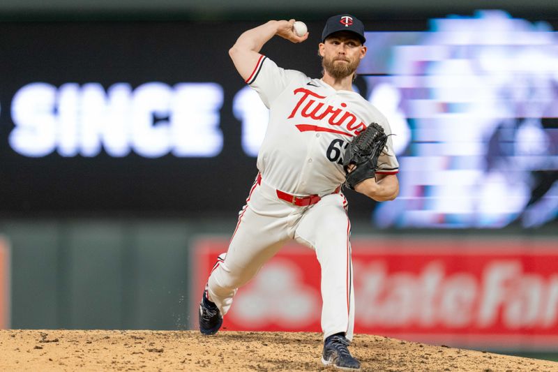 May 15, 2024; Minneapolis, Minnesota, USA; Minnesota Twins pitcher Josh Staumont (63) delivers the ball in the ninth inning against the New York Yankees at Target Field. Mandatory Credit: Matt Blewett-USA TODAY Sports