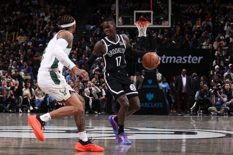 BROOKLYN, NY - OCTOBER 27: Dennis Schroder #17 of the Brooklyn Nets dribbles the ball during the game against the Milwaukee Bucks on October 27, 2024 at Barclays Center in Brooklyn, New York. NOTE TO USER: User expressly acknowledges and agrees that, by downloading and or using this Photograph, user is consenting to the terms and conditions of the Getty Images License Agreement. Mandatory Copyright Notice: Copyright 2024 NBAE (Photo by Nathaniel S. Butler/NBAE via Getty Images)