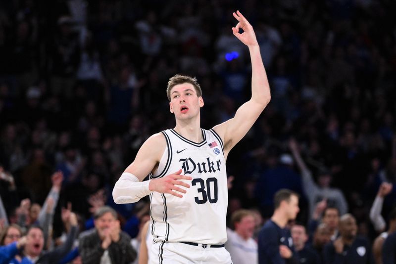 Dec 20, 2023; New York, New York, USA; Duke Blue Devils center Kyle Filipowski (30) reacts after a basket against the Baylor Bears during the second half at Madison Square Garden. Mandatory Credit: John Jones-USA TODAY Sports