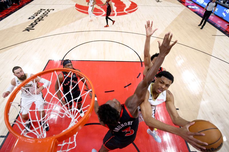 TORONTO, CANADA - FEBRUARY 23: Trey Murphy III #25 of the New Orleans Pelicans goes to the basket against the Toronto Raptors on February 23, 2023 at the Scotiabank Arena in Toronto, Ontario, Canada.  NOTE TO USER: User expressly acknowledges and agrees that, by downloading and or using this Photograph, user is consenting to the terms and conditions of the Getty Images License Agreement.  Mandatory Copyright Notice: Copyright 2023 NBAE (Photo by Vaughn Ridley/NBAE via Getty Images)