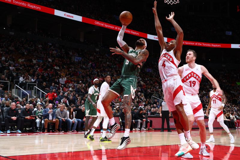 TORONTO, CANADA - JANUARY 6: Gary Trent Jr. #5 of the Milwaukee Bucks dribbles the ball during the game against the Toronto Raptors on January 6, 2025 at the Scotiabank Arena in Toronto, Ontario, Canada.  NOTE TO USER: User expressly acknowledges and agrees that, by downloading and or using this Photograph, user is consenting to the terms and conditions of the Getty Images License Agreement.  Mandatory Copyright Notice: Copyright 2025 NBAE (Photo by Vaughn Ridley/NBAE via Getty Images)