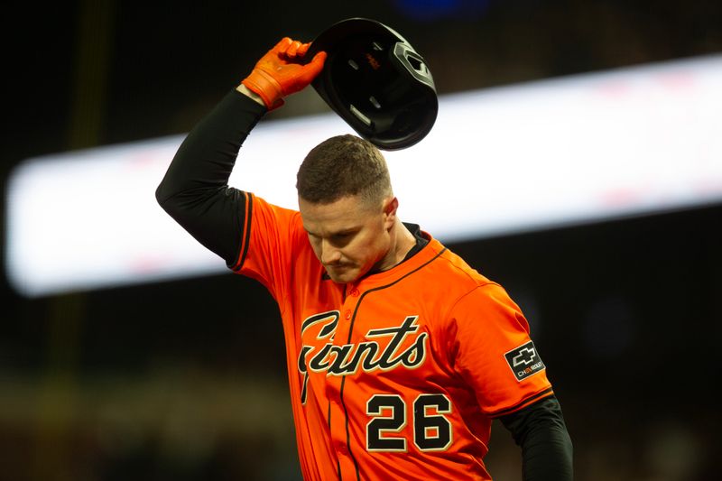 Apr 25, 2025; San Francisco, California, USA; San Francisco Giants third baseman Matt Chapman (26) reacts after striking out to end the sixth inning against the Texas Rangers at Oracle Park. Mandatory Credit: D. Ross Cameron-Imagn Images