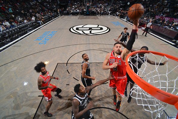 BROOKLYN, NY - NOVEMBER 26: Nikola Vucevic #9 of the Chicago Bulls drives to the basket during the game against the Brooklyn Nets on November 26, 2023 at Barclays Center in Brooklyn, New York. NOTE TO USER: User expressly acknowledges and agrees that, by downloading and or using this Photograph, user is consenting to the terms and conditions of the Getty Images License Agreement. Mandatory Copyright Notice: Copyright 2023 NBAE (Photo by Jesse D. Garrabrant/NBAE via Getty Images)