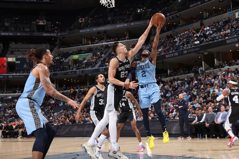 MEMPHIS, TN - APRIL 9: Zach Collins #23 of the San Antonio Spurs blocks a shot during the game against the Memphis Grizzlies on April 9, 2024 at FedExForum in Memphis, Tennessee. NOTE TO USER: User expressly acknowledges and agrees that, by downloading and or using this photograph, User is consenting to the terms and conditions of the Getty Images License Agreement. Mandatory Copyright Notice: Copyright 2024 NBAE (Photo by Joe Murphy/NBAE via Getty Images)