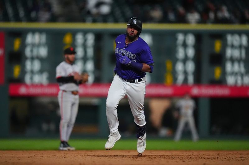 May 8, 2024; Denver, Colorado, USA; Colorado Rockies catcher Elias Díaz (35) runs off a two run home run in the ninth inning against the San Francisco Giants at Coors Field. Mandatory Credit: Ron Chenoy-USA TODAY Sports