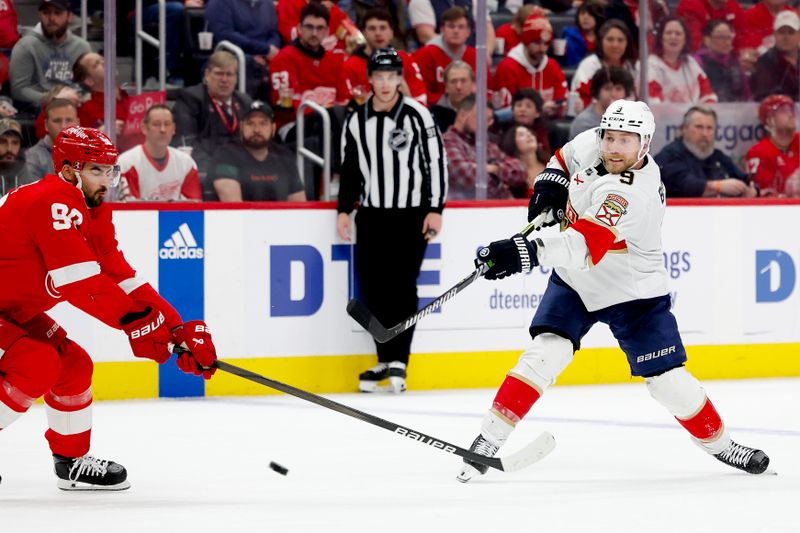 Mar 2, 2024; Detroit, Michigan, USA; Florida Panthers center Sam Bennett (9) takes a shot in the third period against the Detroit Red Wings at Little Caesars Arena. Mandatory Credit: Rick Osentoski-USA TODAY Sports