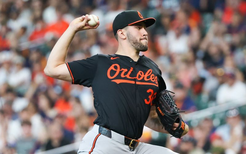 Jun 21, 2024; Houston, Texas, USA; Baltimore Orioles starting pitcher Grayson Rodriguez (30) pitches against the Houston Astros in the first inning at Minute Maid Park. Mandatory Credit: Thomas Shea-USA TODAY Sports