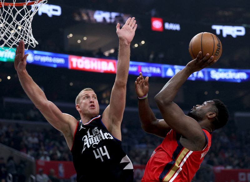 LOS ANGELES, CALIFORNIA - FEBRUARY 07: Zion Williamson #1 of the New Orleans Pelicans shoots a fall away shot in front of Mason Plumlee #44 of the LA Clippers during the first half at Crypto.com Arena on February 07, 2024 in Los Angeles, California. NOTE TO USER: User expressly acknowledges and agrees that, by downloading and/or using this Photograph, user is consenting to the terms and conditions of the Getty Images License Agreement. (Photo by Harry How/Getty Images)