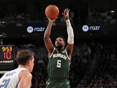 MILWAUKEE, WI - DECEMBER 21: Malik Beasley #5 of the Milwaukee Bucks shoots the ball during the game against the Orlando Magic on December 21, 2023 at the Fiserv Forum Center in Milwaukee, Wisconsin. NOTE TO USER: User expressly acknowledges and agrees that, by downloading and or using this Photograph, user is consenting to the terms and conditions of the Getty Images License Agreement. Mandatory Copyright Notice: Copyright 2023 NBAE (Photo by Gary Dineen/NBAE via Getty Images).